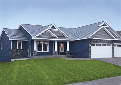 blue metal roof on white house|metal roof and siding combinations.